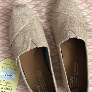Tan colored canvas Toms